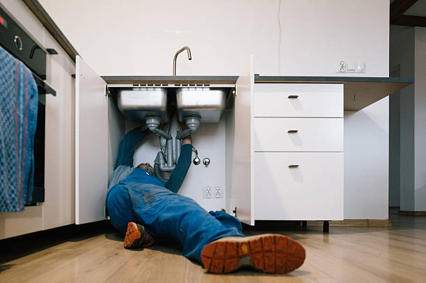 Professional Emergency Plumber technician working in Marble Falls, TX